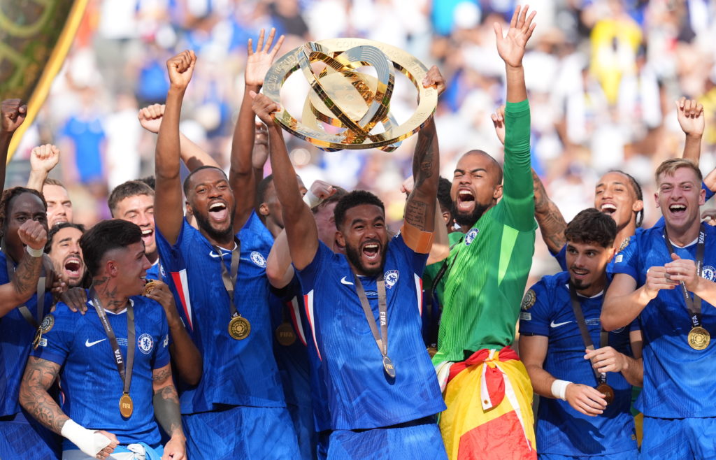 Chelsea celebrate with the trophy after beating PSG to win the Club World Cup.