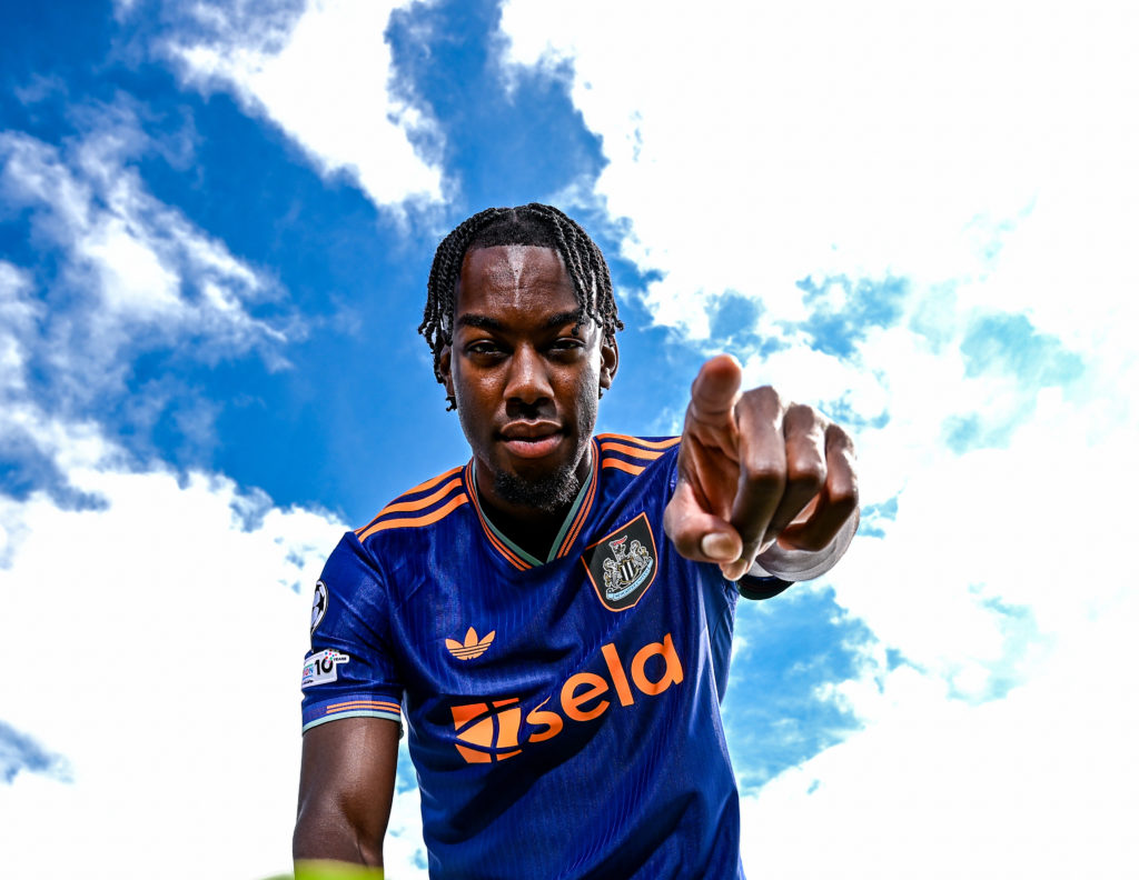 Anthony Elanga poses in Newcastle United's third kit after signing from Nottingham Forest.
