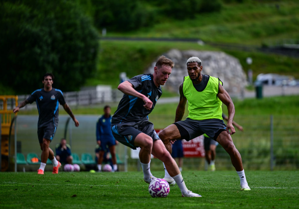 Sean Longstaff runs with the ball during a Newcastle United pre-season training session.