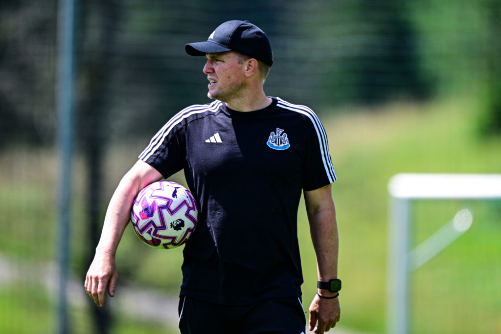 Eddie Howe holds a ball under his arm during a Newcastle United pre-season training session in August.