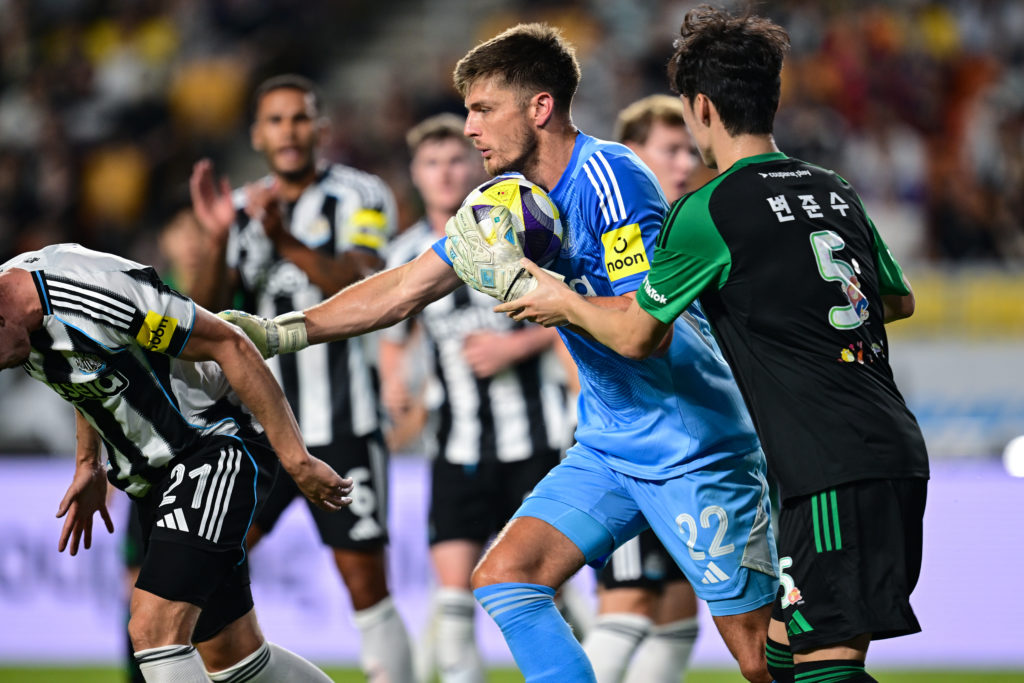 Nick Pope carries the ball during Newcastle United's game against Team K League.