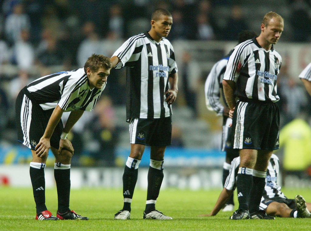 Jonathan Woodgate, Jermaine Jenas, and Alan Shearer look dejected after Kieron Dyer missed a penalty.
