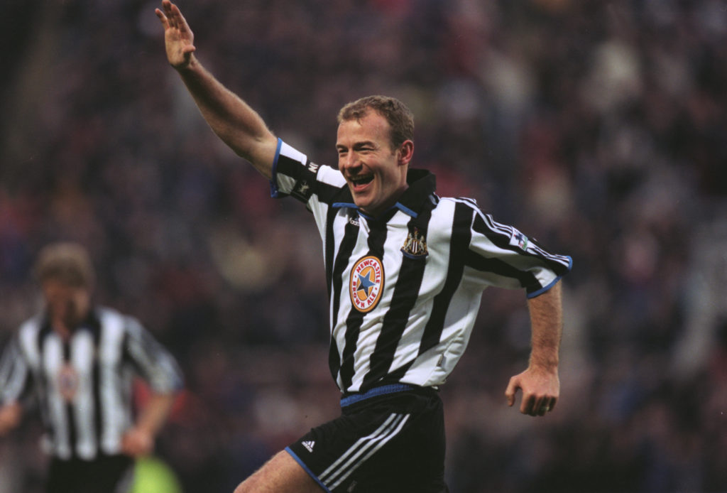 Alan Shearer celebrates scoring for Newcastle United against Manchester United in the Premier League.