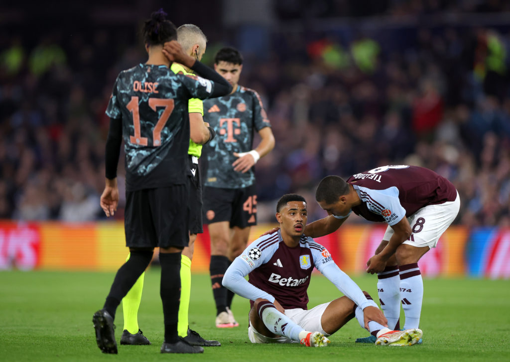 Jacob Ramsey goes down with an injury during a Champions League game for Aston Villa.