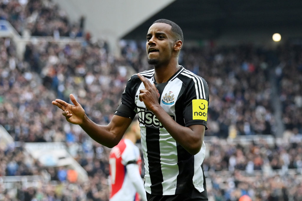Alexander Isak celebrates after scoring in a Premier League game between Newcastle United and Arsenal.