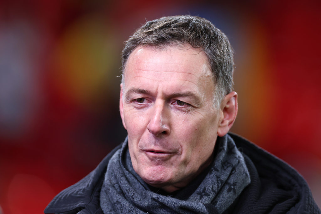 Chris Sutton looks on at Anfield while doing punditry for a Champions League game.
