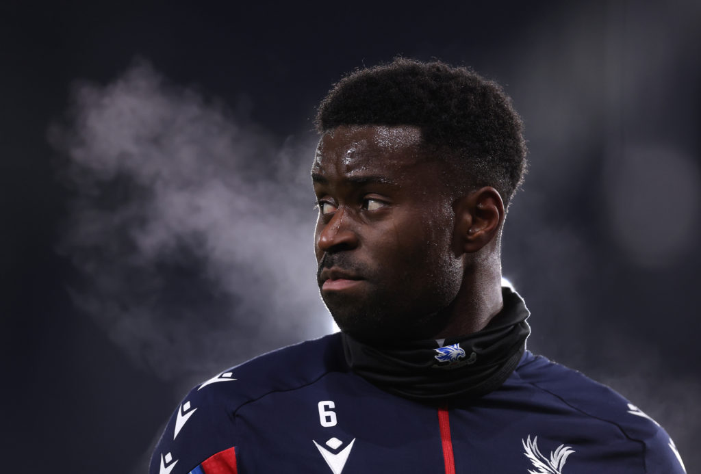 Marc Guehi warms up ahead of Ipswich Town vs Crystal Palace in the Premier League.