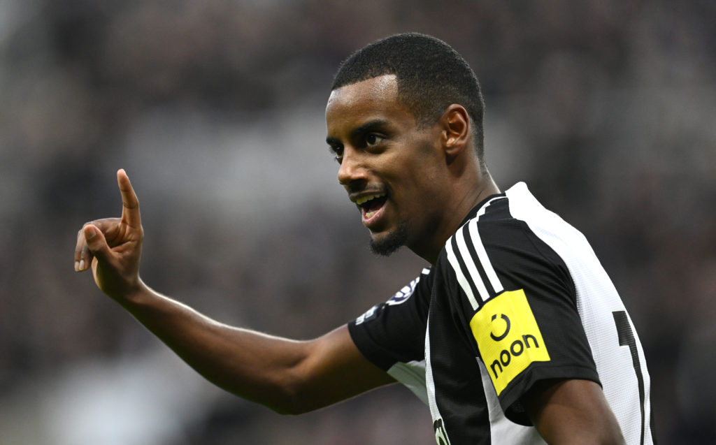 Alexander Isak points his finger during a game between Newcastle United and Aston Villa.