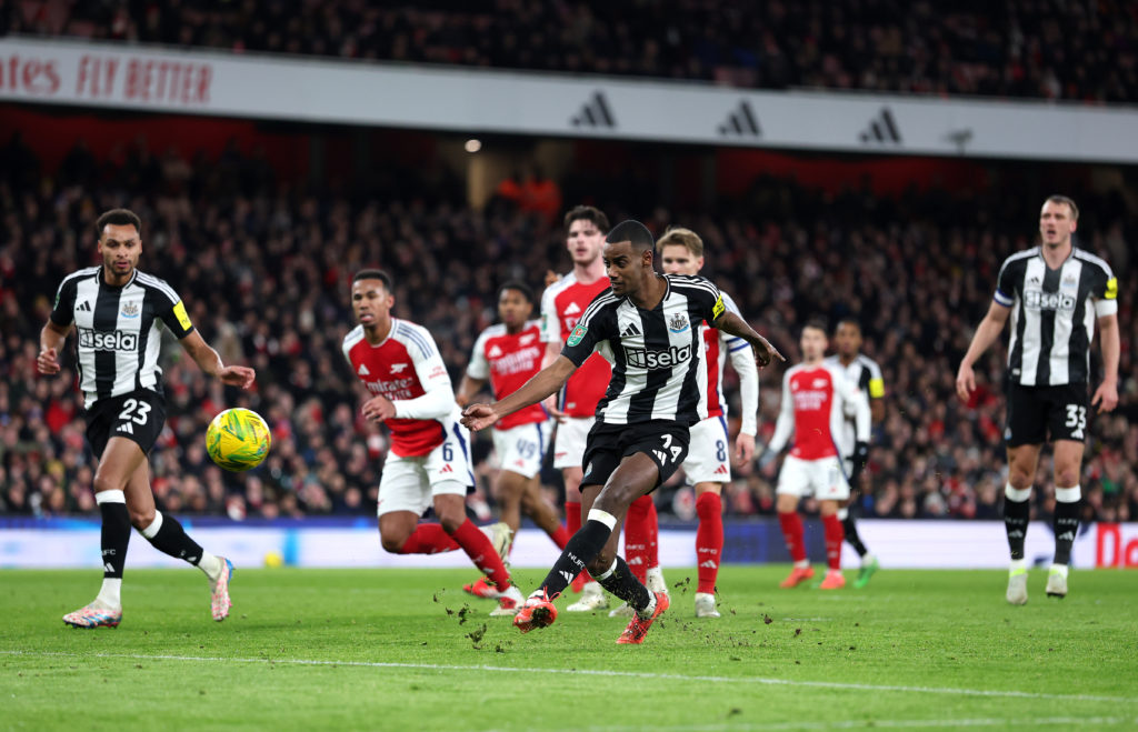 Alexander Isak scores a goal in the Carabao Cup semi-final for Newcastle United against Arsenal.