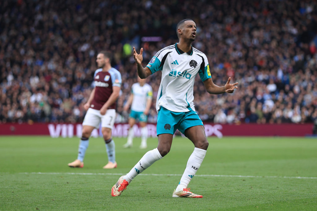 Alexander Isak rues a missed chance in a game between Aston Villa and Newcastle United.