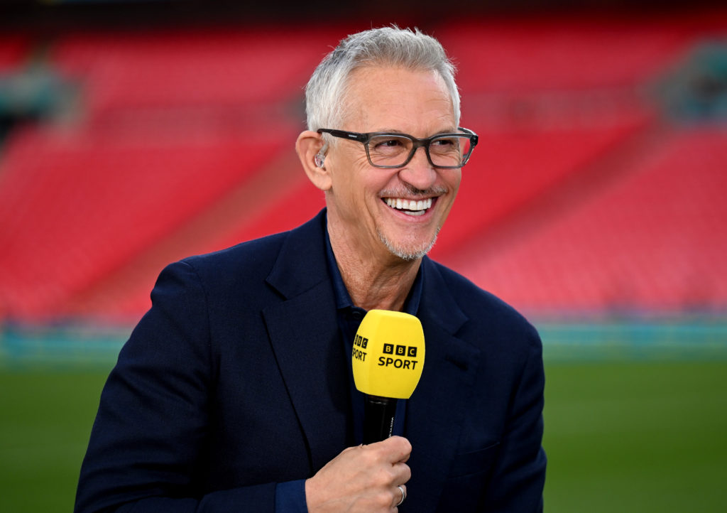 Gary Lineker smiles while presenting an FA Cup semi-final at Wembley.