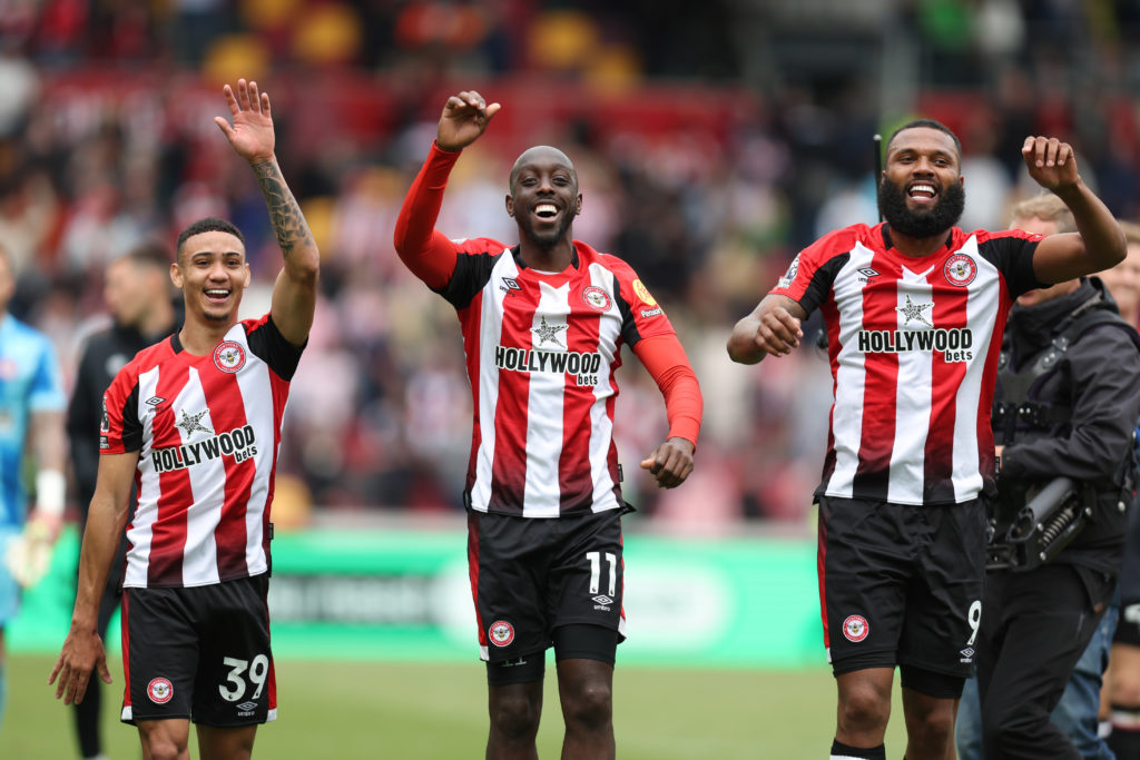 Yoane Wissa and his teammates celebrate Brentford's win over Manchester United.