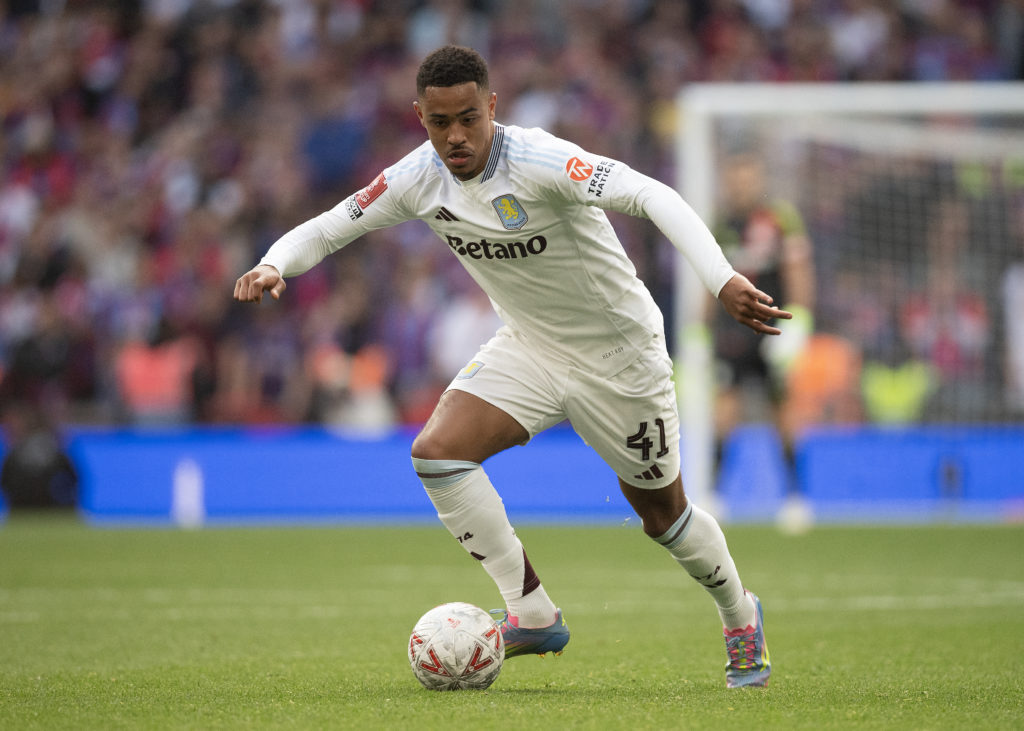 Jacob Ramsey runs with the ball for Aston Villa against Crystal Palace.