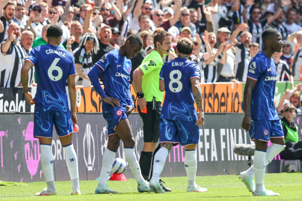 Nicolas Jackson looks dejected after being sent off during Chelsea vs Newcastle United.
