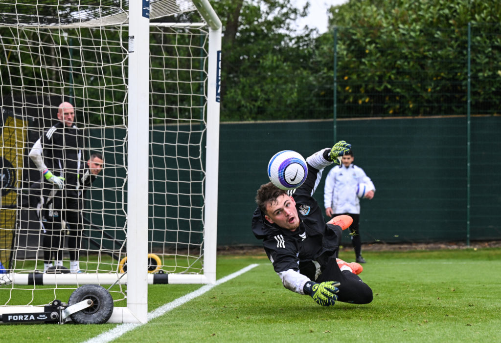 Aidan Harris dives for a ball during a Newcastle United Training Session