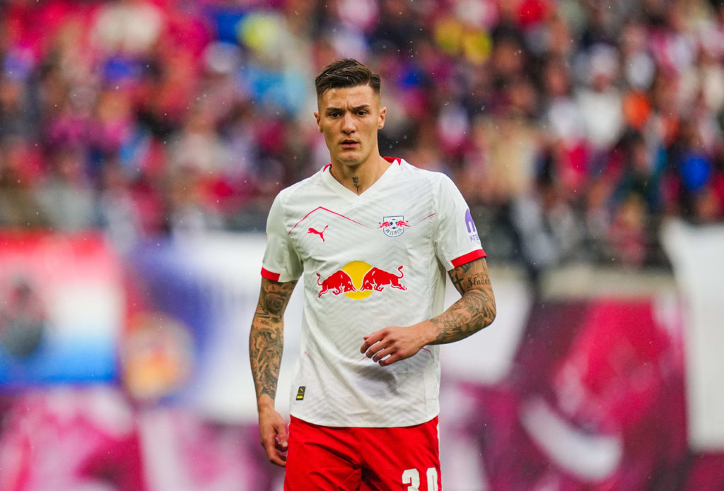 Benjamin Sesko in action during a Bundesliga game between RB Leipzig and Stuttgart.