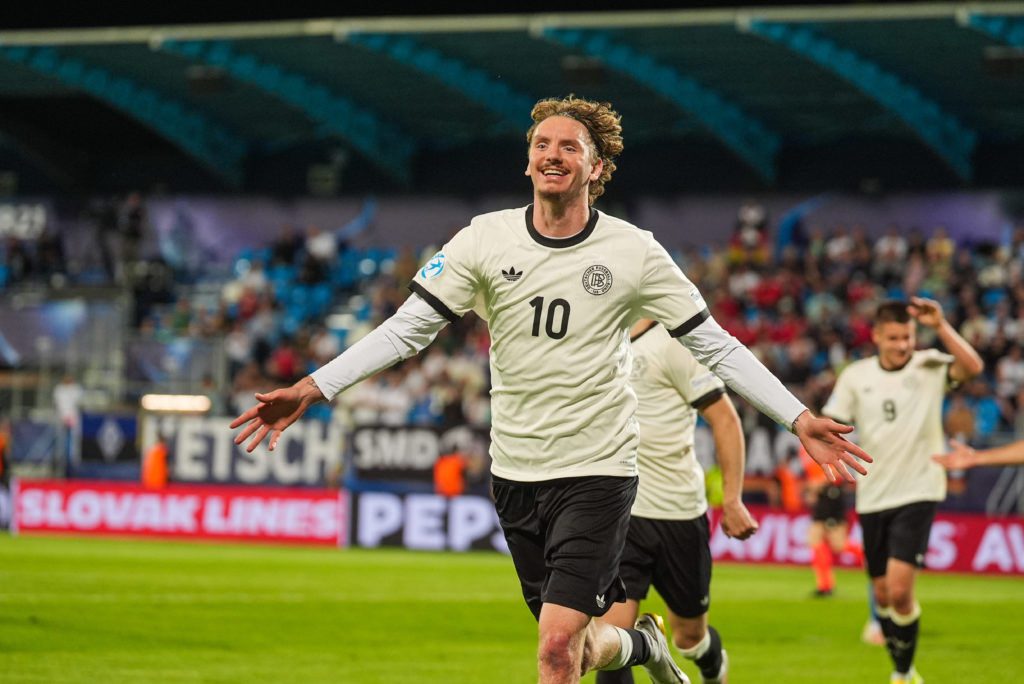 Nick Woltemade celebrates scoring for Germany Under-21s against Slovenia Under-21s.