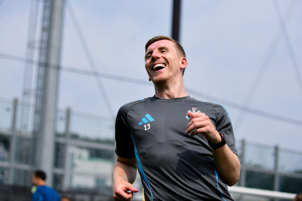 Matt Targett laughing during a Newcastle United training session in pre-season.