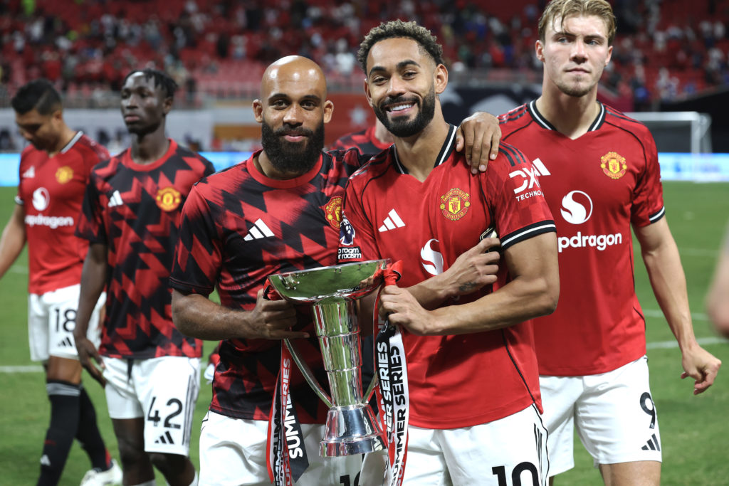 Bryan Mbeumo and Matheus Cunha with the Premier League Summer Series trophy.