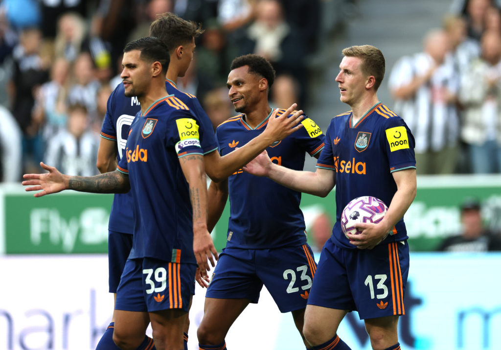 Newcastle United players celebrate after a goal in a friendly between Newcastle United and RCD Espanyol.