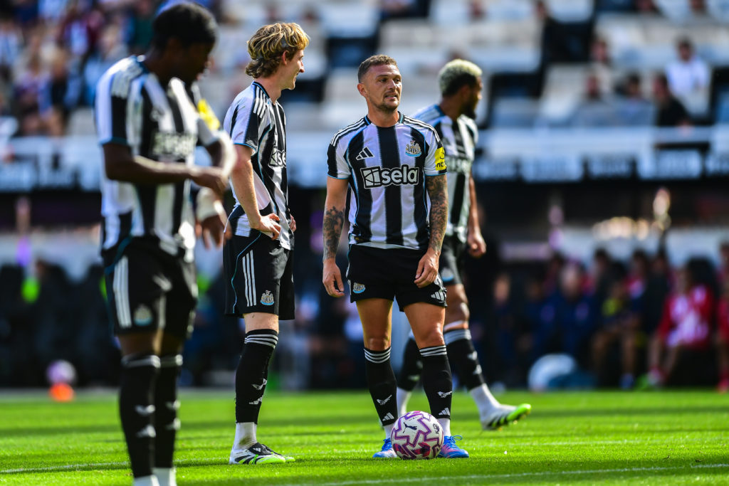 Kieran Trippier and Anthony Gordon line up for a free-kick during a friendly between Newcastle United and Atletico Madrid.