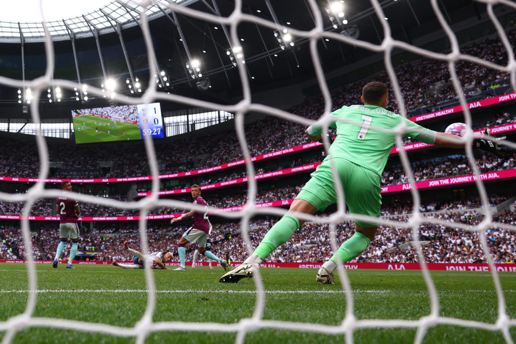 Martin Dubravka tries to stop Richarlison's goal for Tottenham against Burnley.
