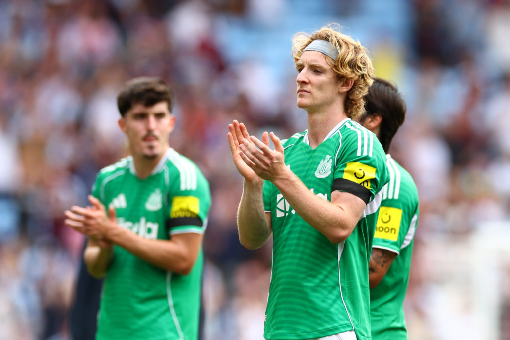Anthony Gordon applauds the fans following a game between Aston Villa and Newcastle United.