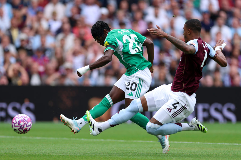 Anthony Elanga takes a shot during a Premier League game between Aston Villa and Newcastle United.