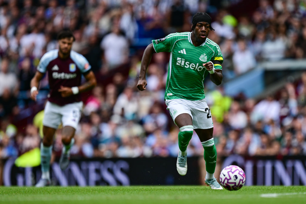 Anthony Elanga drives with the ball during a Premier League game between Aston Villa and Newcastle United.