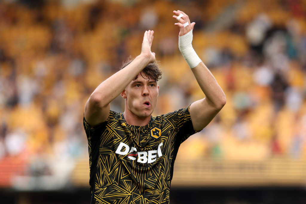 Jorgen Strand Larsen warms up before a Premier League game between Wolves and Manchester City.