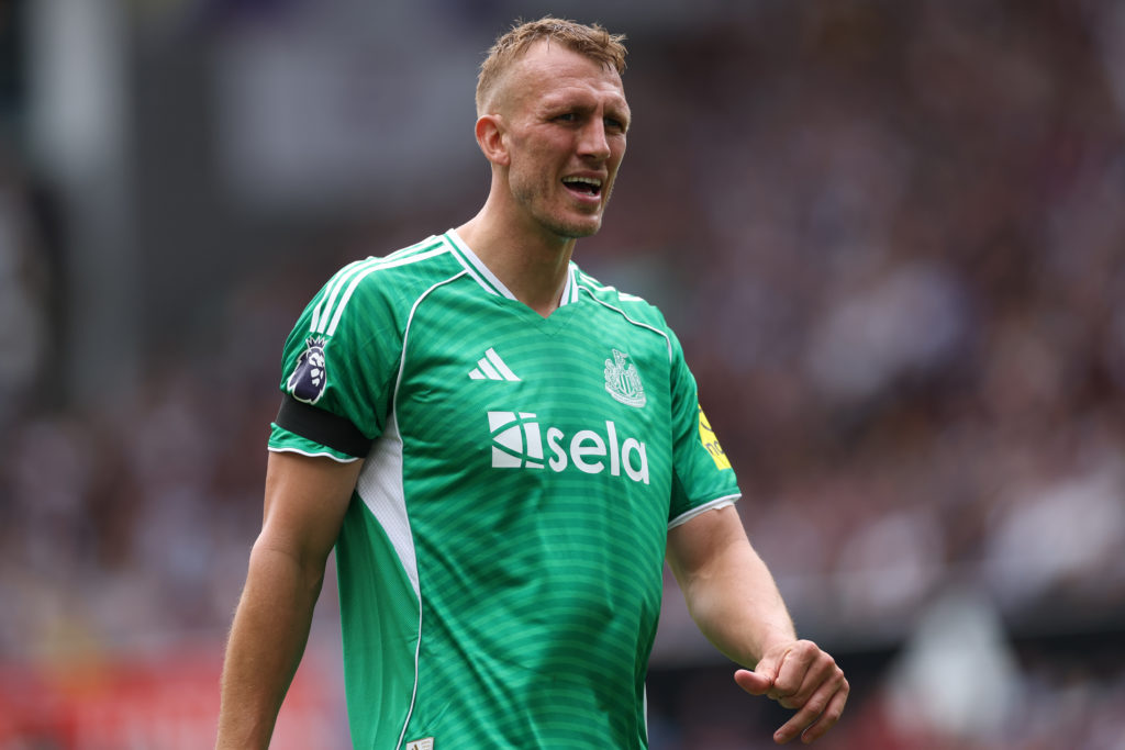 Dan Burn playing for Newcastle United against Aston Villa.