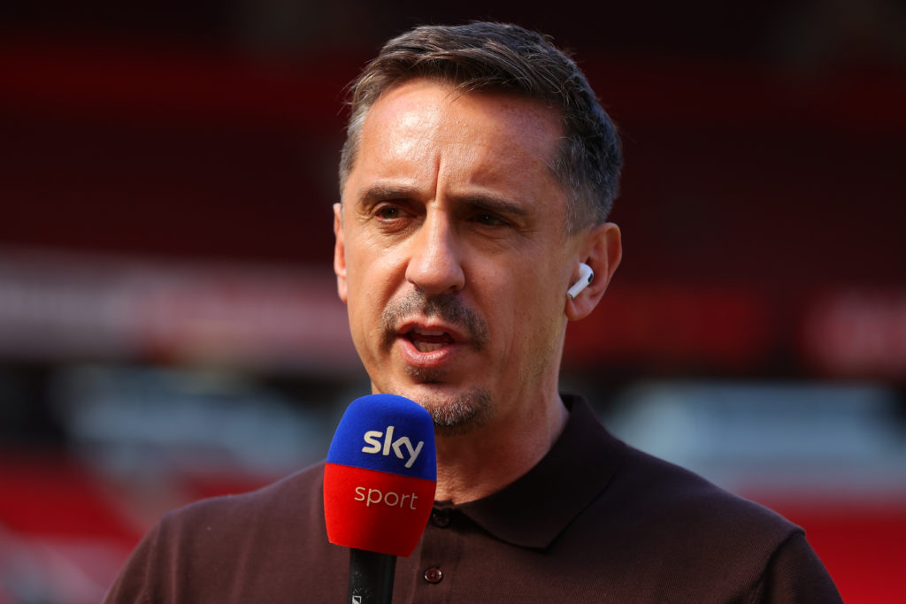 Sky Sports pundit Gary Neville speaking to a TV camera at Old Trafford for Manchester United vs Arsenal.