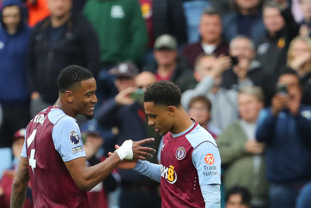 Jacob Ramsey and Ezri Konsa celebrate after a goal during a Premier League game between Aston Villa and Brighton.