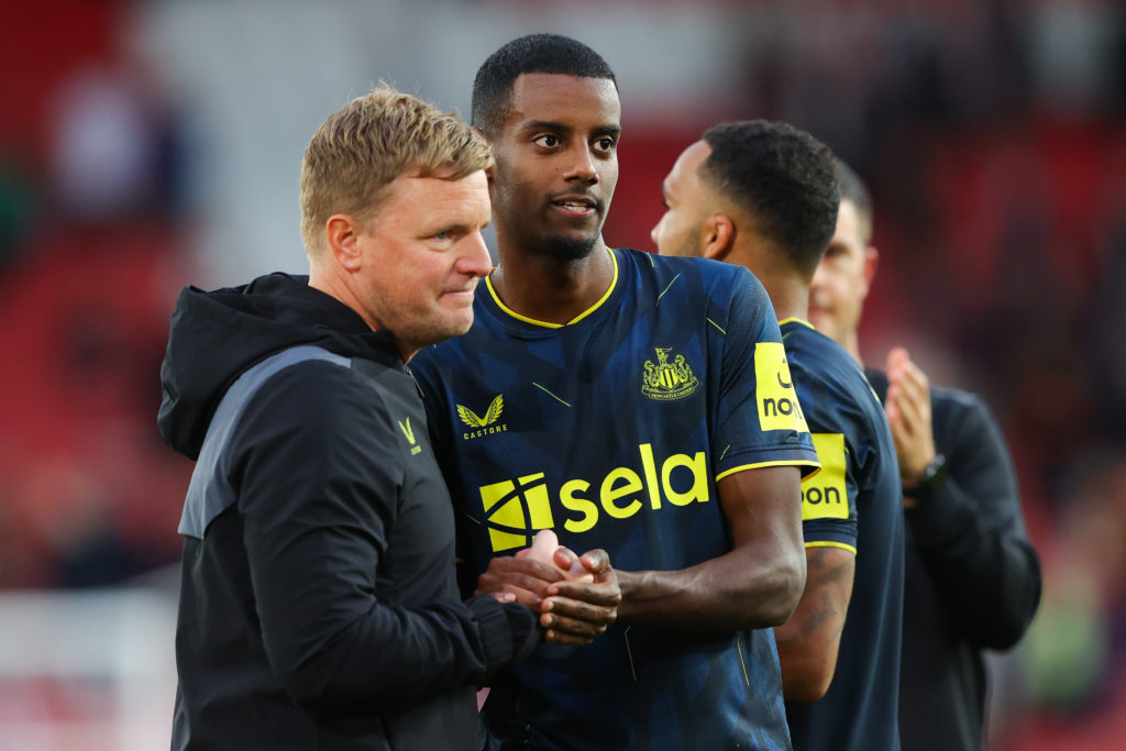 Eddie Howe and Alexander Isak shake hands after Newcastle United's win over Sheffield United.