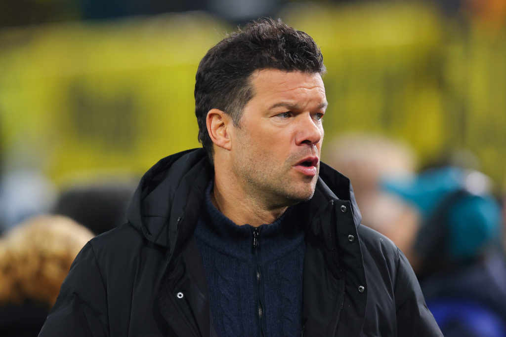 Michael Ballack does punditry during a Champions League game between Borussia Dortmund and Barcelona.
