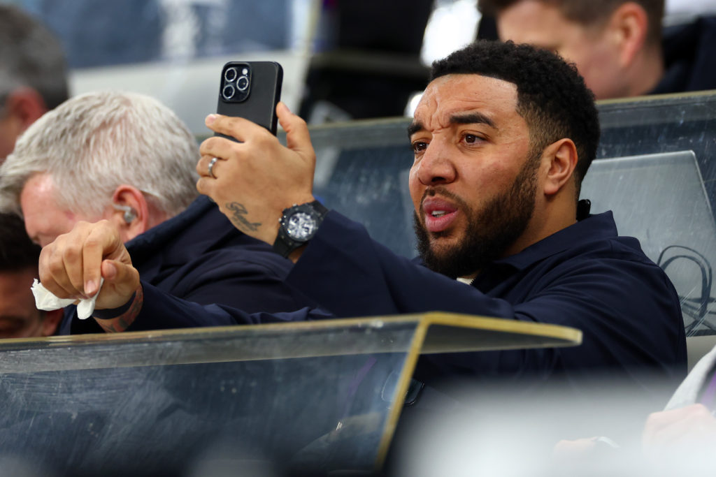 Troy Deeney prepares to do commentary for the Carabao Cup semi-final between Newcastle United and Arsenal.