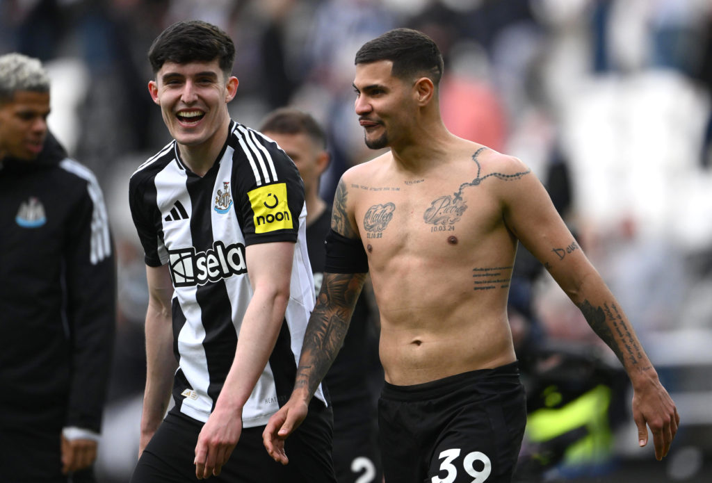 Tino Livramento and Bruno Guimaraes laugh together after Newcastle United's win over Manchester United.