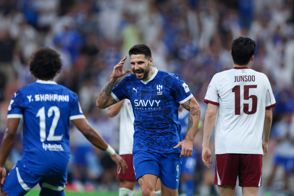 Aleksandar Mitrovic celebrates scoring a goal for Al Hilal.