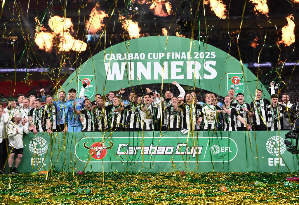 Newcastle United players celebrate with the Carabao Cup trophy after beating Liverpool in the final at Wembley.