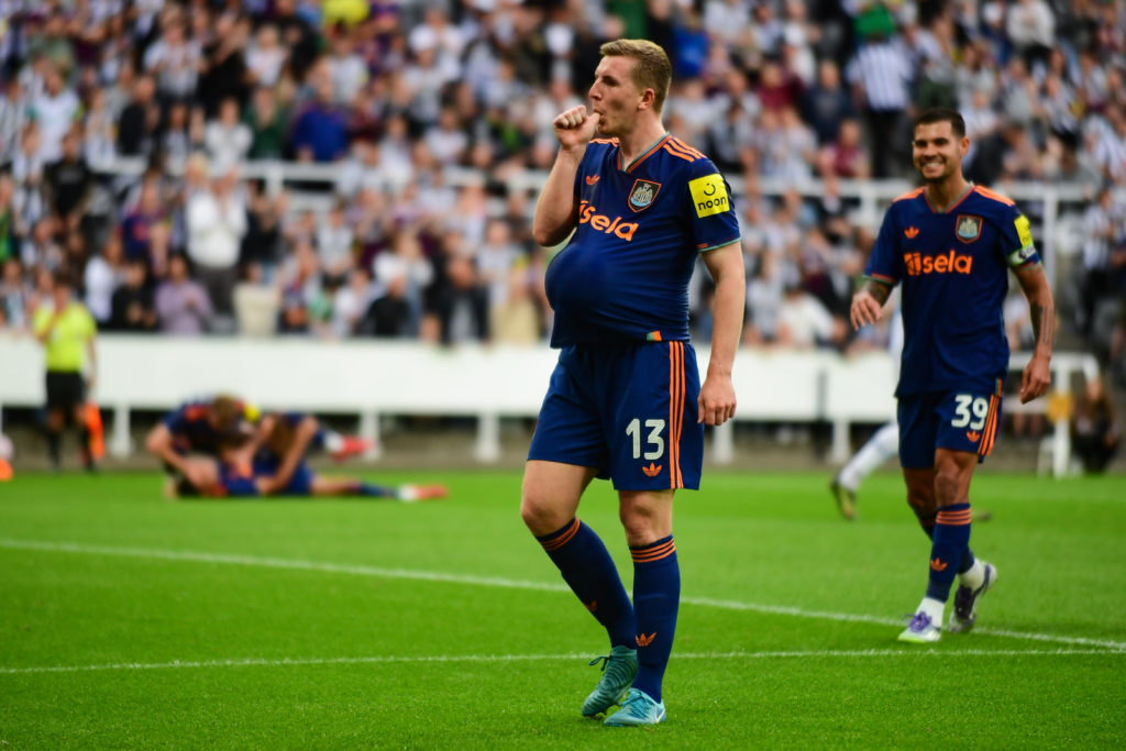 Matt Targett celebrates a goal during a friendly between Newcastle United and Espanyol.