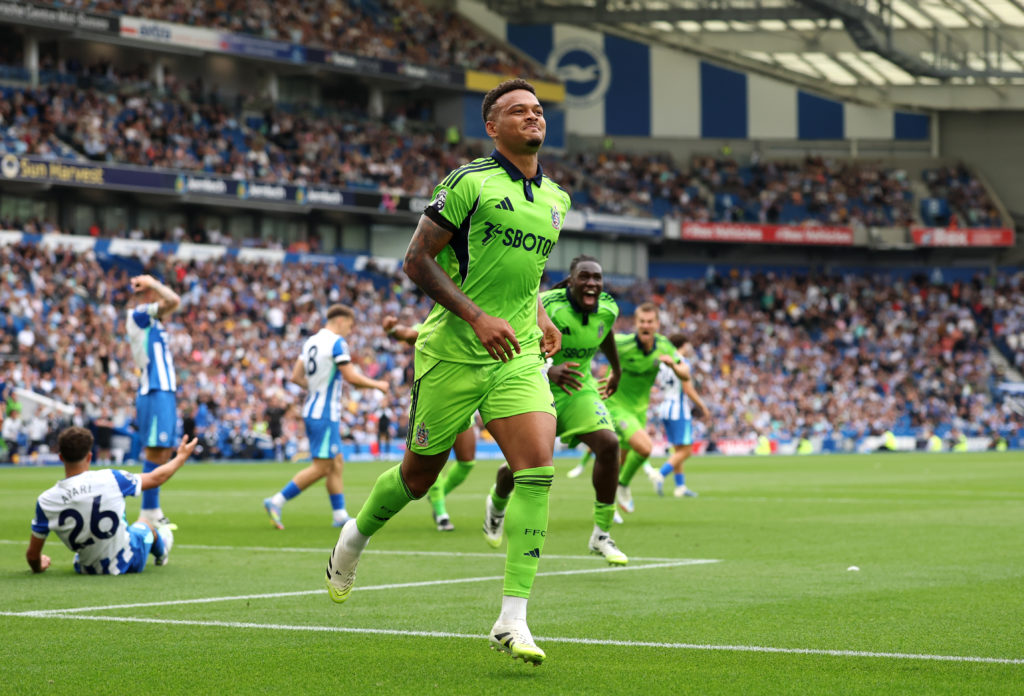 Rodrigo Muniz runs off in celebration after scoring for Fulham against Brighton.