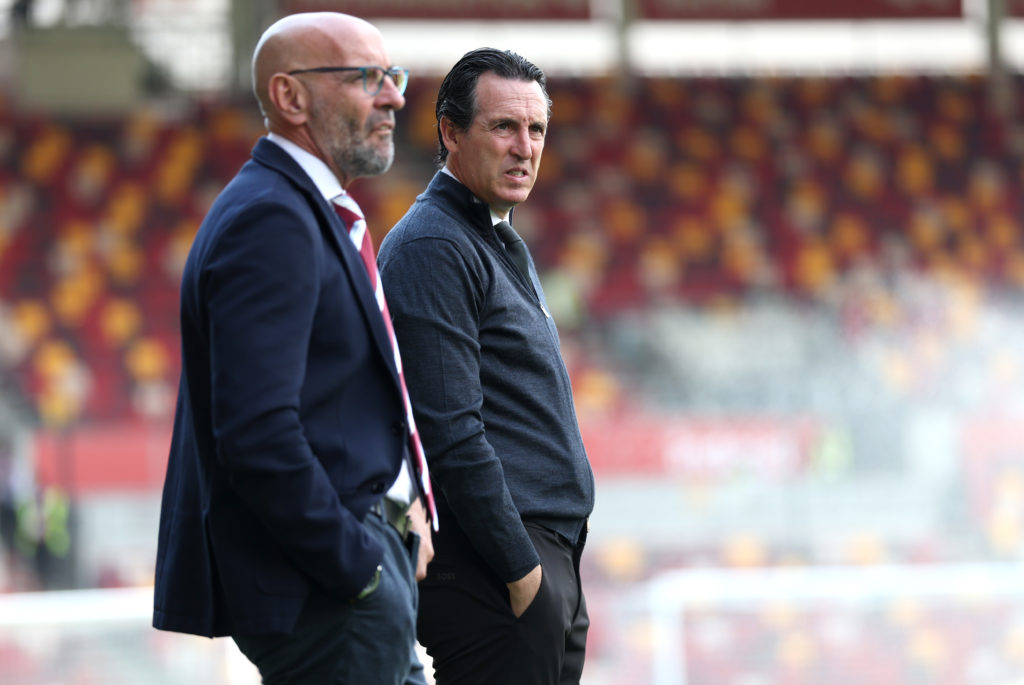 Unai Emery and Monchi look on before a Premier League game between Brentford and Aston Villa.
