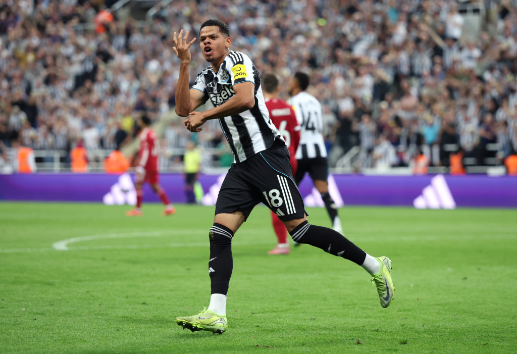 Will Osula celebrates after scoring in a Premier League game between Newcastle United and Liverpool.