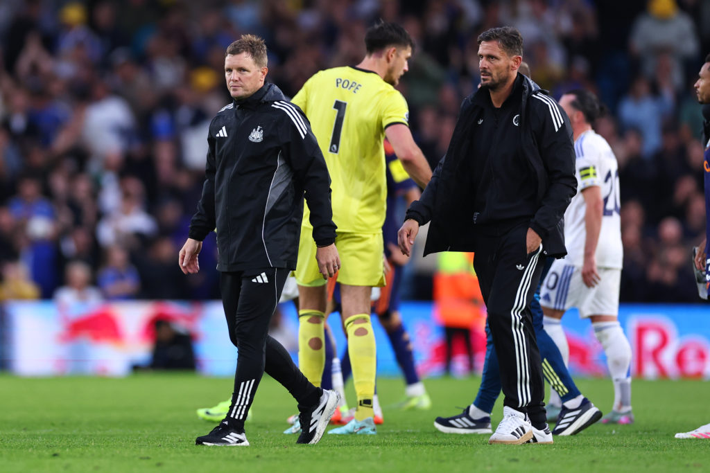 Eddie Howe on the pitch after a Premier League game between Leeds United and Newcastle United.