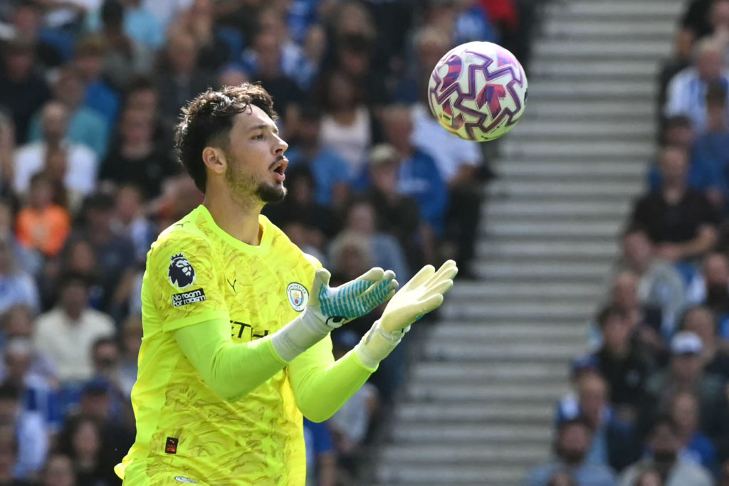 James Trafford catches the ball during Manchester City's game against Brighton.