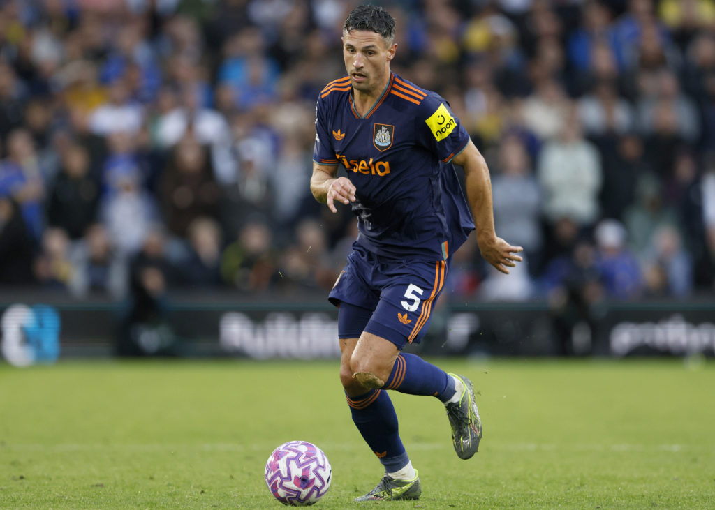 Fabian Schar carries the ball during a Premier League game between Leeds United and Newcastle United.