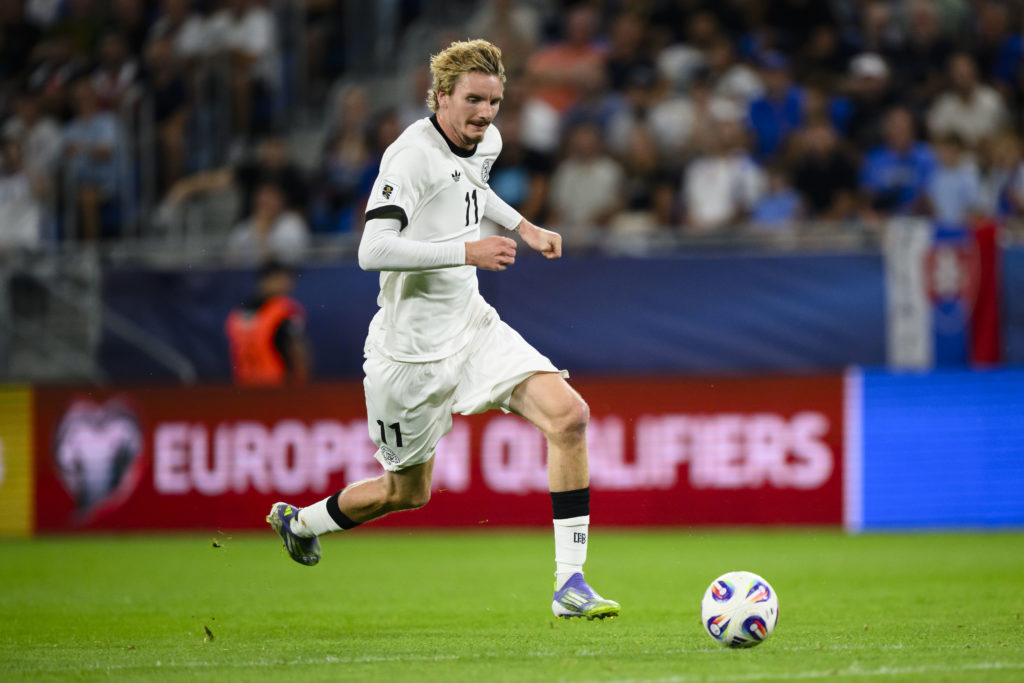 Nick Woltemade carries the ball during an international game between Slovakia and Germany.