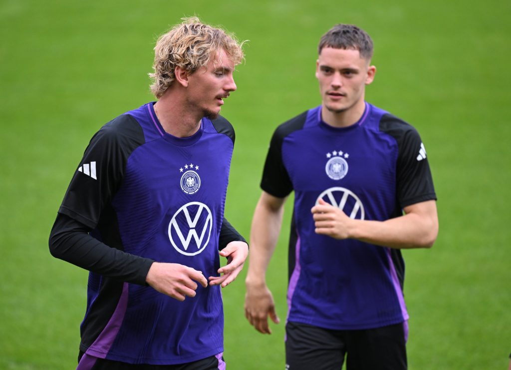 Nick Woltemade trains with Germany teammate Florian Wirtz.