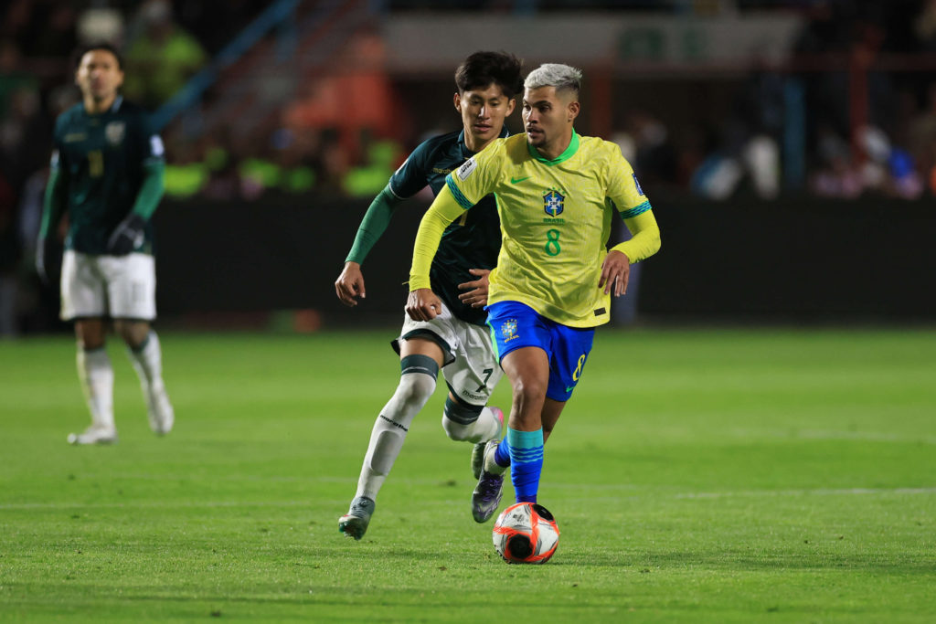 Bruno Guimaraes runs with the ball during a World Cup qualifier between Brazil and Bolivia.