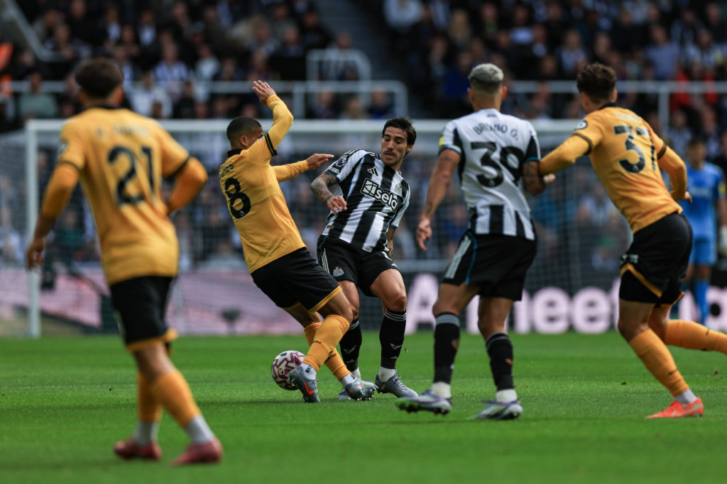 Sandro Tonali tackles Joao Gomes during Newcastle United vs Wolves in the Premier League.
